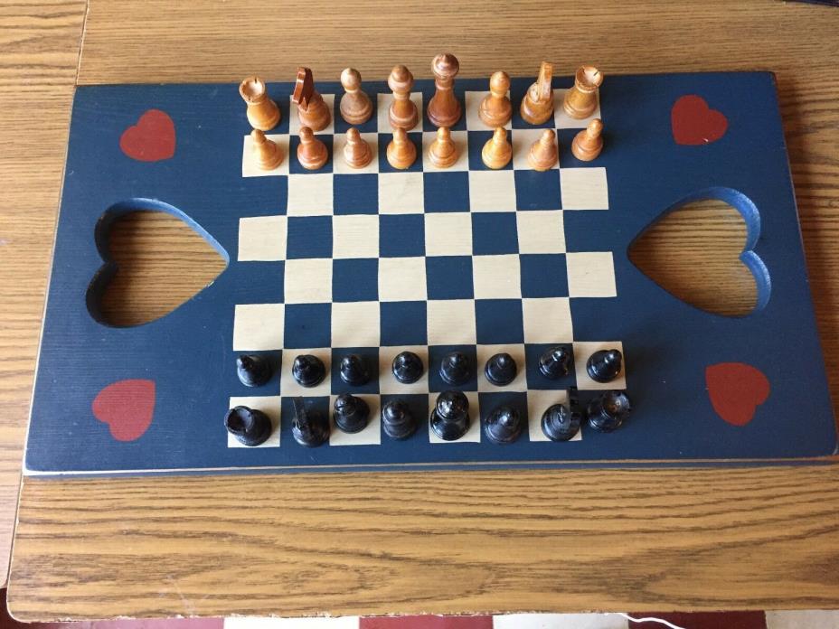 BEAUTIFUL ALL WOOD CHESS SET WITH BOARD THAT HAS FORM AND DRAWING OF HEART