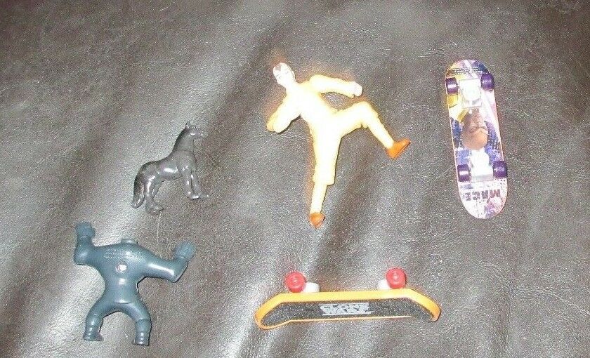 MIXED LOT OF TOYS-2 MEAN LOOKING MEN-1 SMALL HORSE-2 SMALL SKATE BOARDS