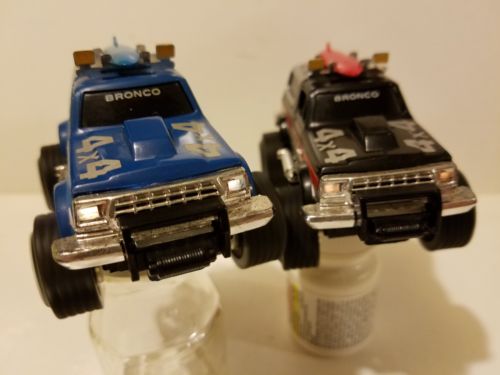 VINTAGE SCHAPER STOMPER 4X4 FORD BRONCO X 2 WITH BRONCO ON THE WINDSHIELD. RARE!