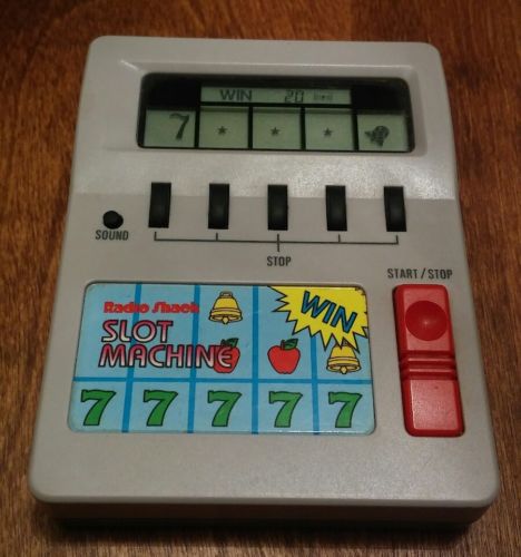 Radio Shack Slot Machine vintage LCD Mini handheld electronic game 60-2464 WORKS