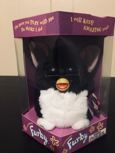 1998 TIGER ELECTRONICS--ELECTRONIC BLACK/WHITE RARE CLOSED EYES. NEW. SEALED