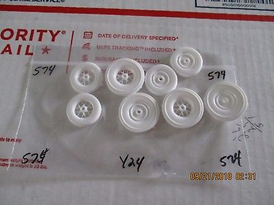Four (4) Plastic tires in Haves   (parts only) 1/24 scale  package #574