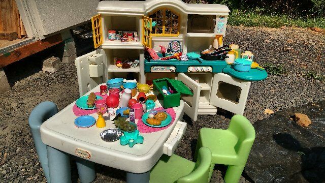 Little Tyke Kitchen Table and four chairs plus lots of food stuff, spoons, turne