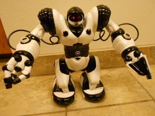 WowWee Robosapien interactive toy robot w/ remote control, users manual and hat
