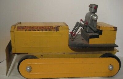 Old Metal Battery Operated Tractor w/Plastic articulated Space Robot Driver