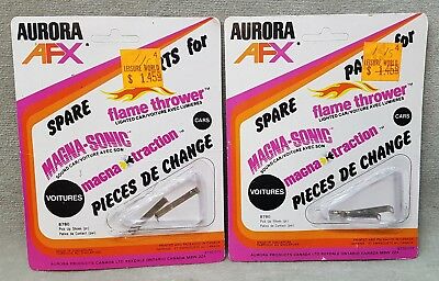 2 Aurora AFX Slot Car Pickup Shoes in packages.