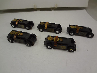 5 NOS ORIGINAL AURORA OPEN RIVET T-JET BLACK MAGNET CHASSIS