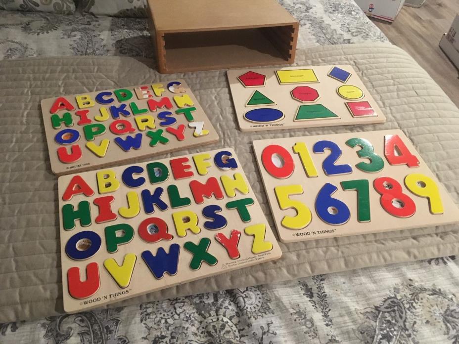 Wooden Puzzle Storage Rack Includes 4 Puzzles Alphabets Shapes Numbers