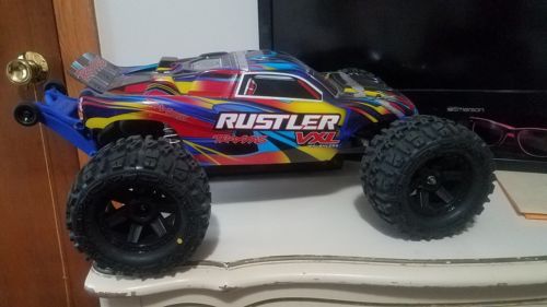 Traxxas rustler vxl used  used couple times new cooling fan new tires  charger