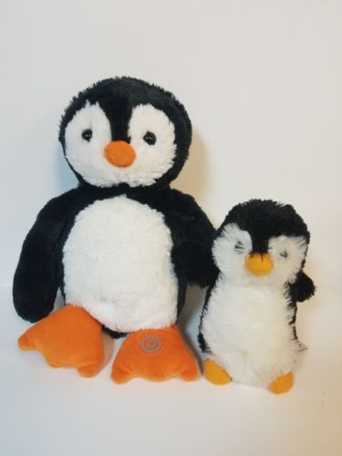 2 Plush Penguins black and white, big penguin vibrates Aurora stuffed animal