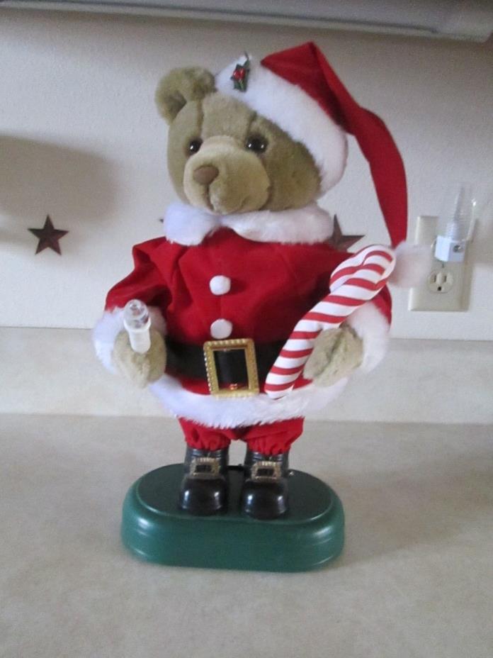 RARE VINTAGE Avon  ANIMATED MUSICAL SANTA TEDDY BEAR WITH CANDY CANE AND CANDLE