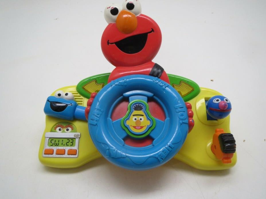 Fisher-Price Sesame Street Giggle 'n Go Driver - Elmo (Discontinued)