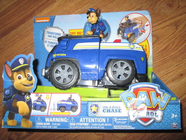 PAW PATROL ON A ROLL CHASE Squeeze & push in transforms & rolls NEW NIB