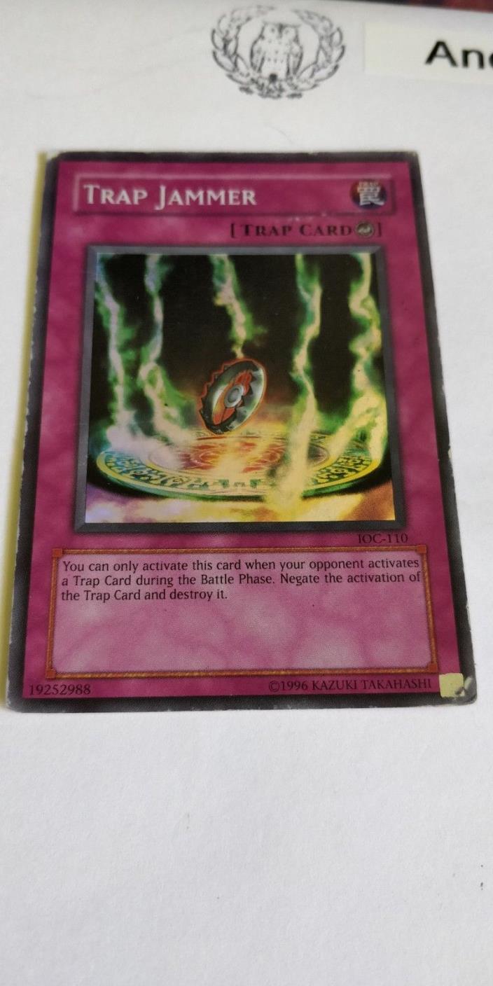 TRAP JAMMER - UNLIMITED  SUPER RARE  HEAVILY PLAYED DAMAGED IOC-110 - YUGIOH