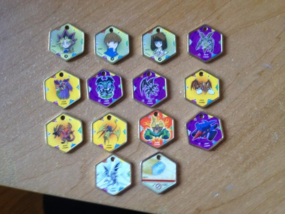 Lot of 14 Yugioh Hexors Metal Medallions Coins Charm Tokens