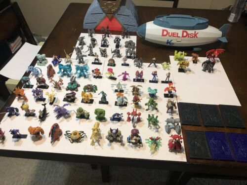 Yugioh Massive Collection!! Must See! 77 Mini Figures! Two Cases And Cards!!