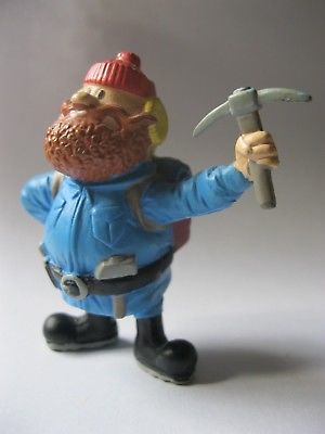 YUKON CORNELIUS stamped The Rudolph Company solid plastic figurine about 2.75