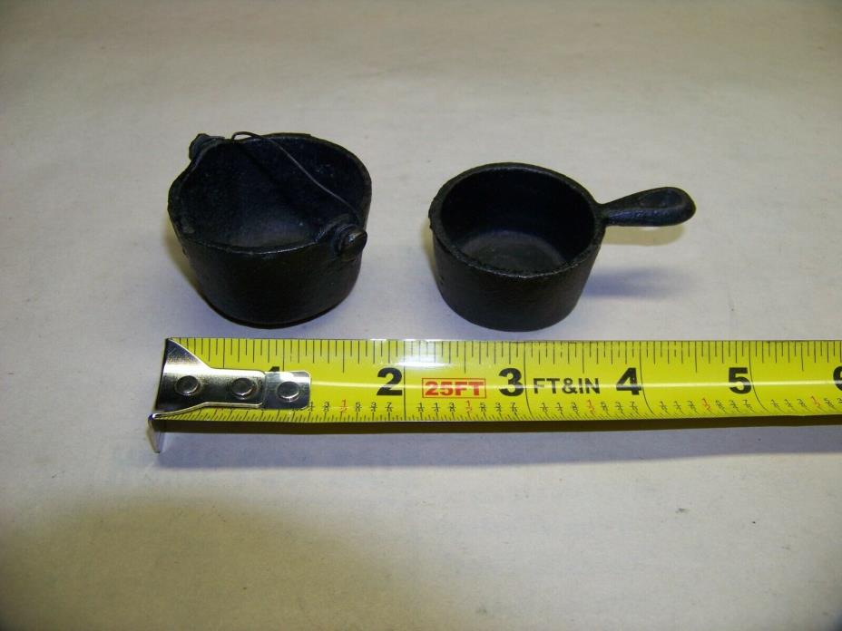 Pair of miniature cast iron cooking pots