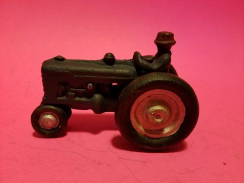 Antique Vintage Toy Tractor with farmer Cast Iron wheels