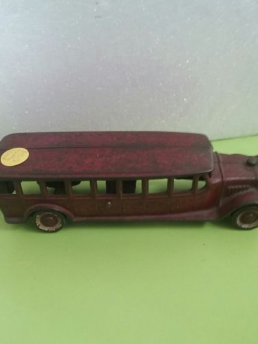 hubley cast iron 8 inch bus. red color