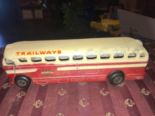 VINTAGE CAST IRON TRAILWAYS BUS by REALISTIC TOY COMPANY