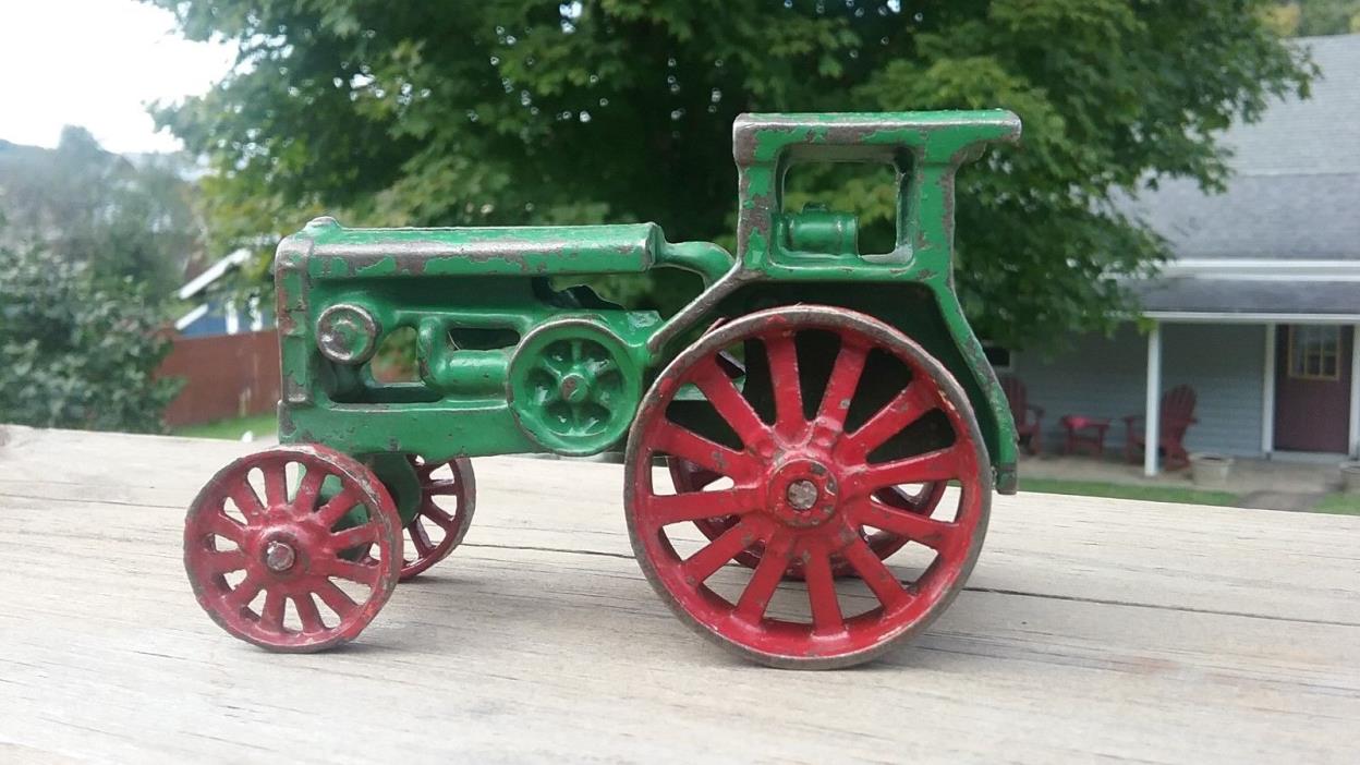Antique Cast Iron Arcade Green Tractor with Red Wheels