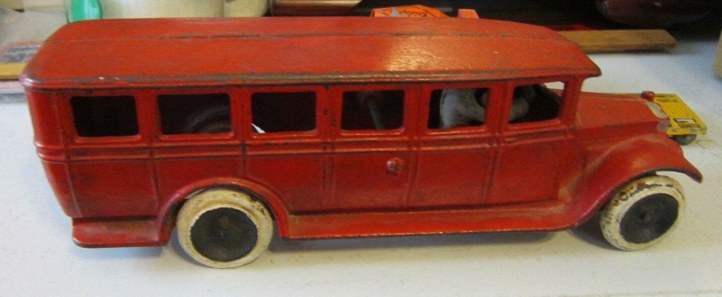 Vintage Red SKOGLUND & OLSON-SETO Cast Iron TOY BUS w/Driver c.1970