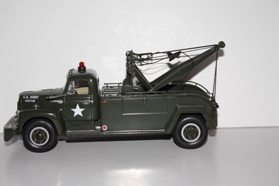 VINTAGE CAST IRON ARMY TOW TRUCK