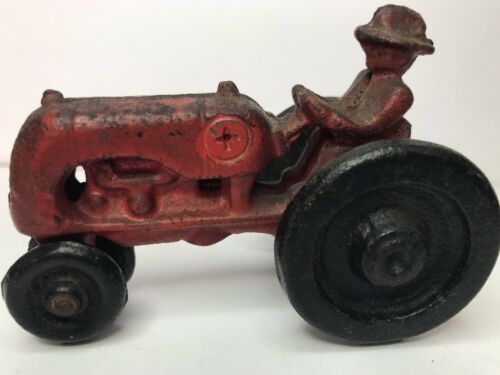 Antique Vintage Toy Red Tractor with farmer Cast Iron wheels