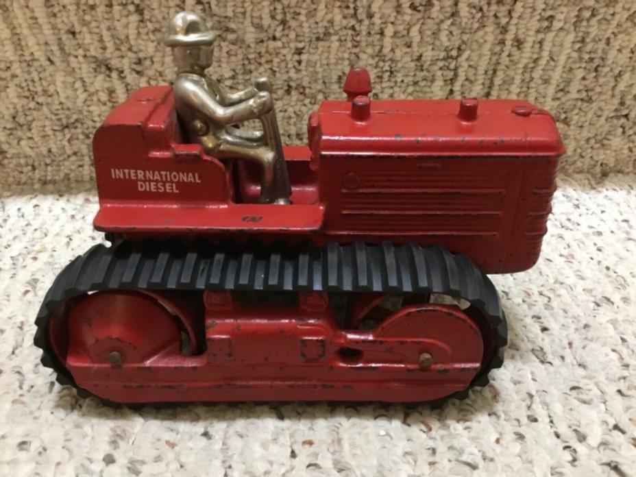 Vintage Arcade Cast Iron International Harvestor Crawler Toy with Nickel Man
