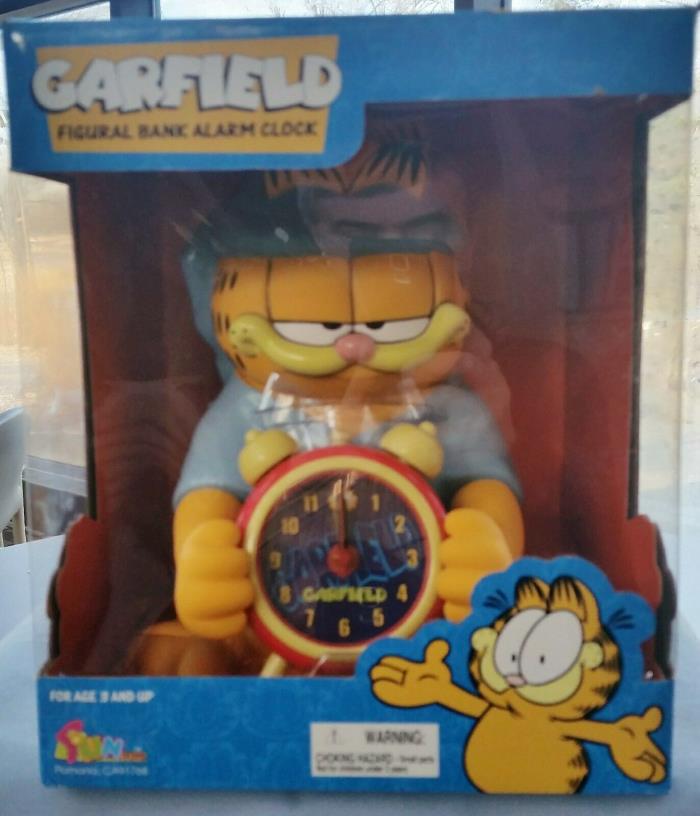 GARFIELD  ALARM CLOCK and BANK . NEW WITH BOX AND INSTRUCTIONS