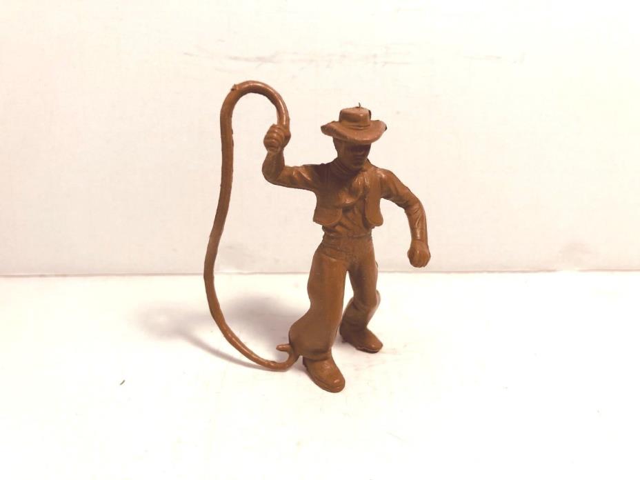 Marx 1950's 60mm Cowboy with whip from early Western Town set.  Brown