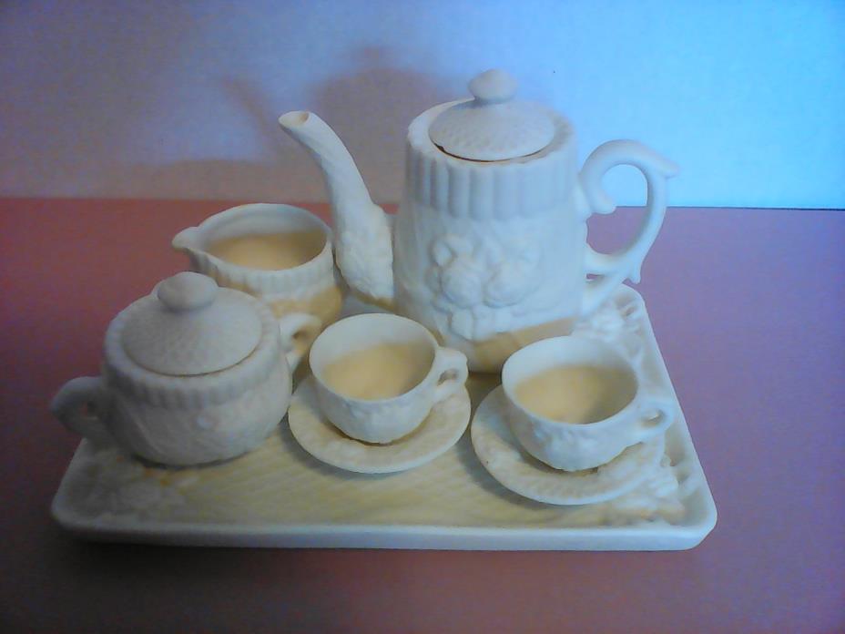 Vintage toy ceramic tea set, 10 pieces, white/cream color,patterned with flowers