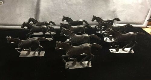 VINTAGE LOT OF 10 UNPAINTED LEAD METAL SOLDIER’S HORSES. Signed