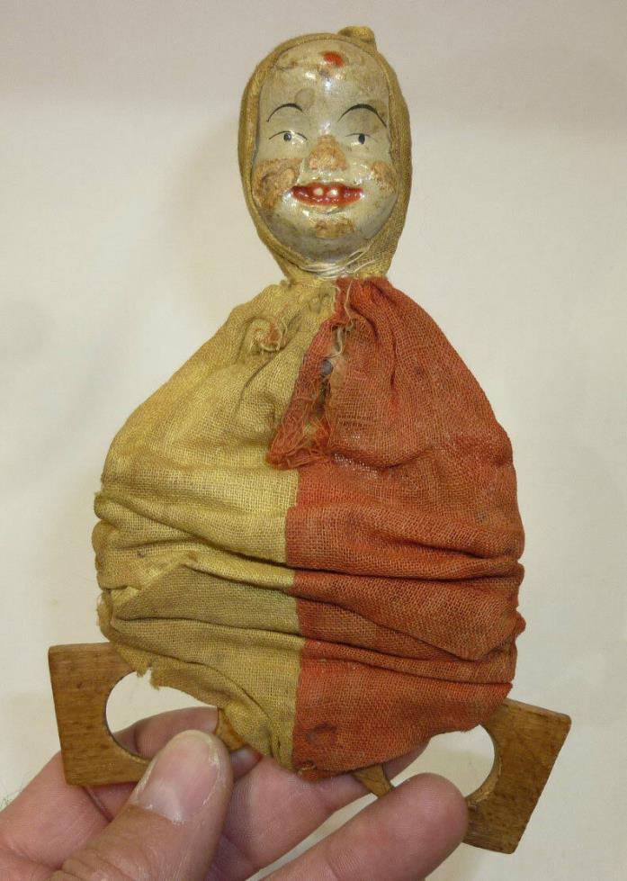 Early character scissor toy, clown face, early 20th century comic character toy