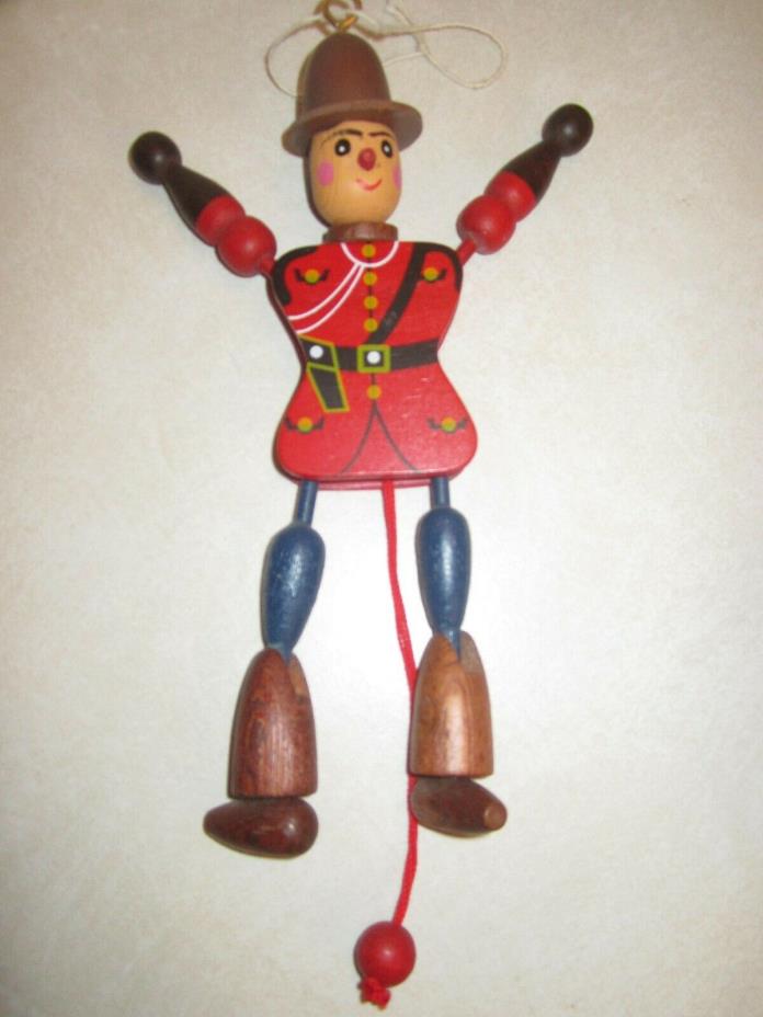 vintage wooden Canadian Mounty jumping-jack (marionette) string puppet