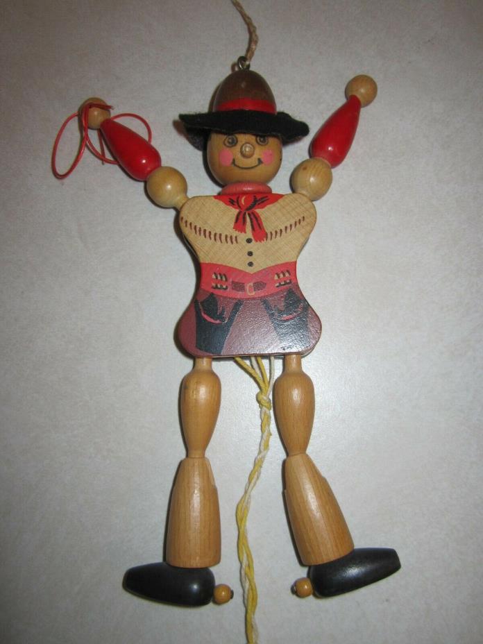 vintage wooden cowboy jumping-jack (marionette) puppet