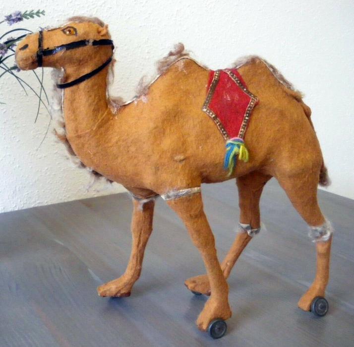 exceptional Rarity Victorian Christmas  paper Mache CAMELwith  saddle  pull toy