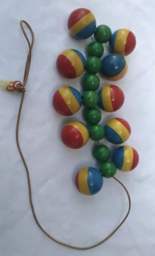Vintage Wooden Rolling Pull Toy Primary Colors Jointed Roller Toy