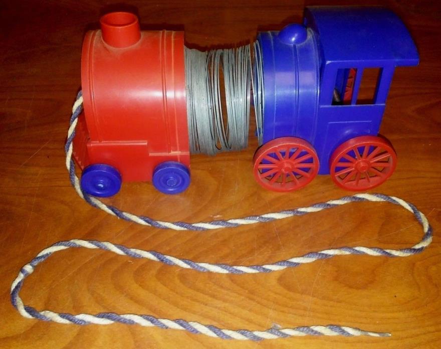 Vintage Slinky Style Train Pull Toy Plastic Metal Slinky Rare Blue Red color 60s