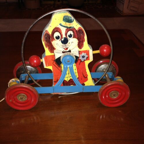 Vintage Gong Bell Company Pressed Steel Dog Clown Chime Pull Toy 1949 USA Rare