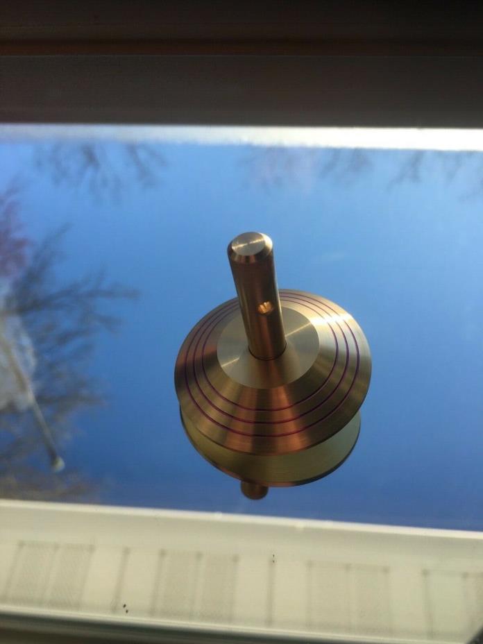 Brass spinning top with ceramic bearing, rip cord and tapper (over 14 min spin)