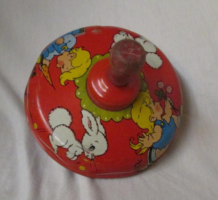 1940's Ohio Art Elaine Eads Hileman spinning top - Boy Chasing Bunny Rabbit