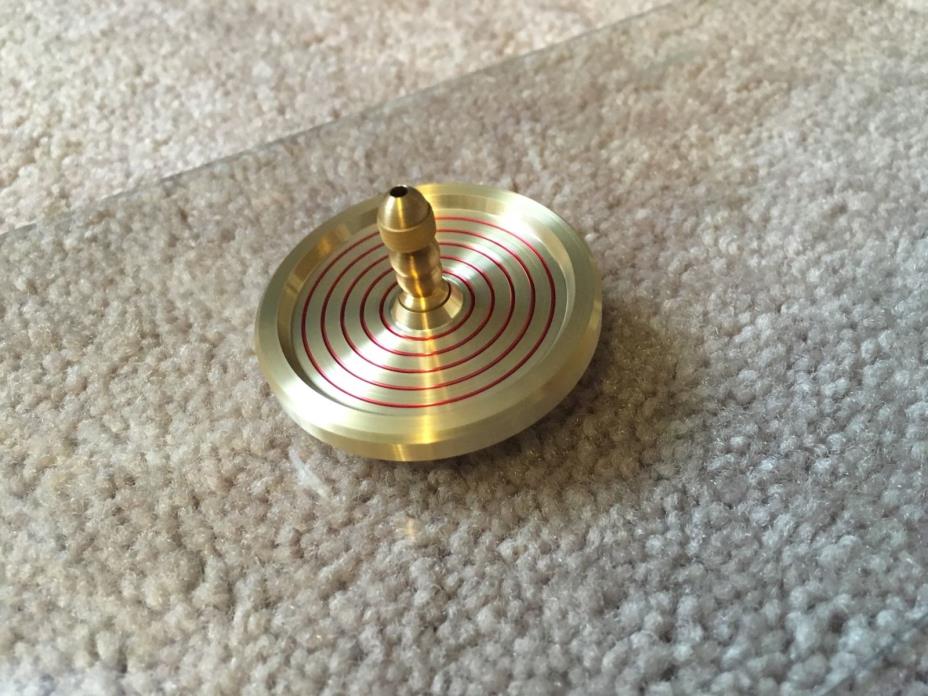 Brass spinning top with ceramic bearing and red ring design (over 7 min spin)