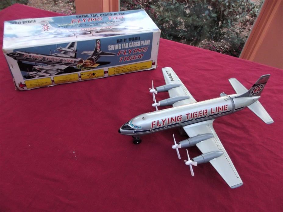 FLYING TIGER ELECTRA BATTERY OPERATED SEQUENCED SWING TAIL CARGO PLANE 60's NICE