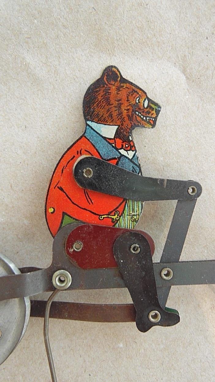 Antique A.C. Gilbert Teddy Bear Litho Tin Balancing Toy Bike String Ride 1920's