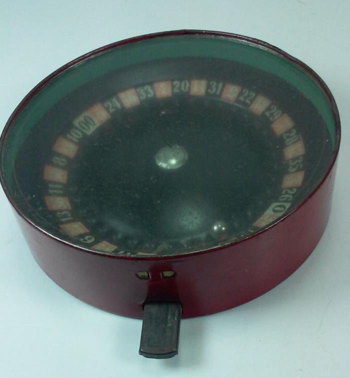 1930s HAND HELD TIN AND CARDBOARD ROULETTE WHEEL WORKS GREAT