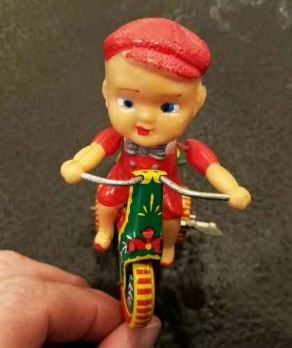 MECHANICAL TIN WINDUP TOY BOY ON TRICYCLE - BELL - VERY COLORFUL  REPRO   (219)