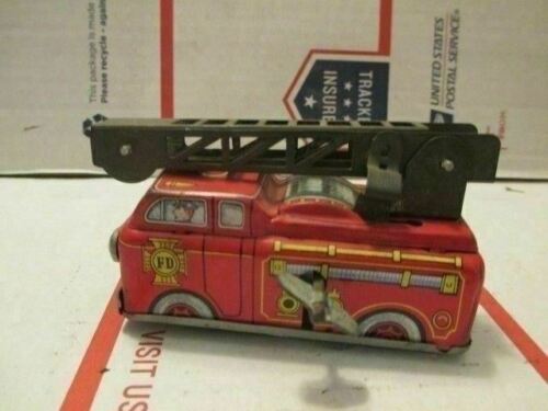 j146) Antique Yone Japan Shackman Red Windup Tin Toy Fire Truck/Ladder No. 2038
