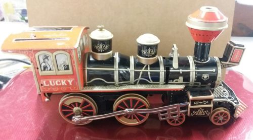 Vintage LUCKY Tin Toy Made In Japan battery toy